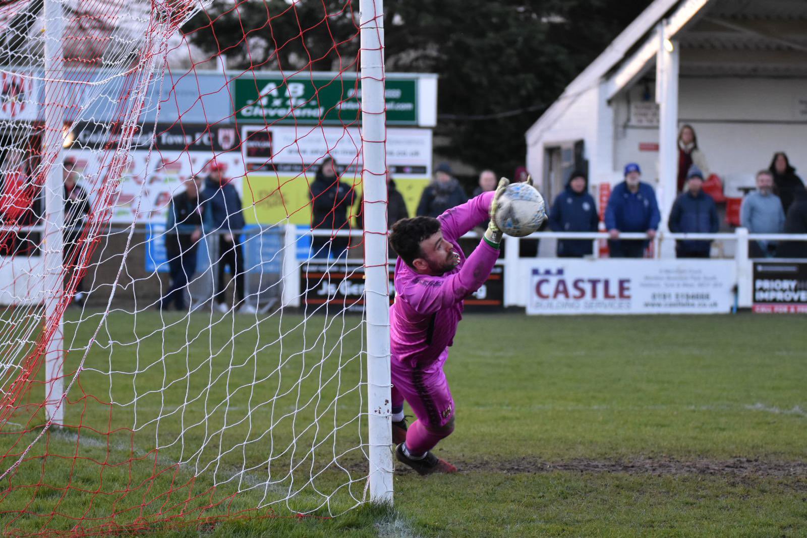 Guisborough Town goalkeeper, Robert Dean, saves a last minute penalty against Carlisle