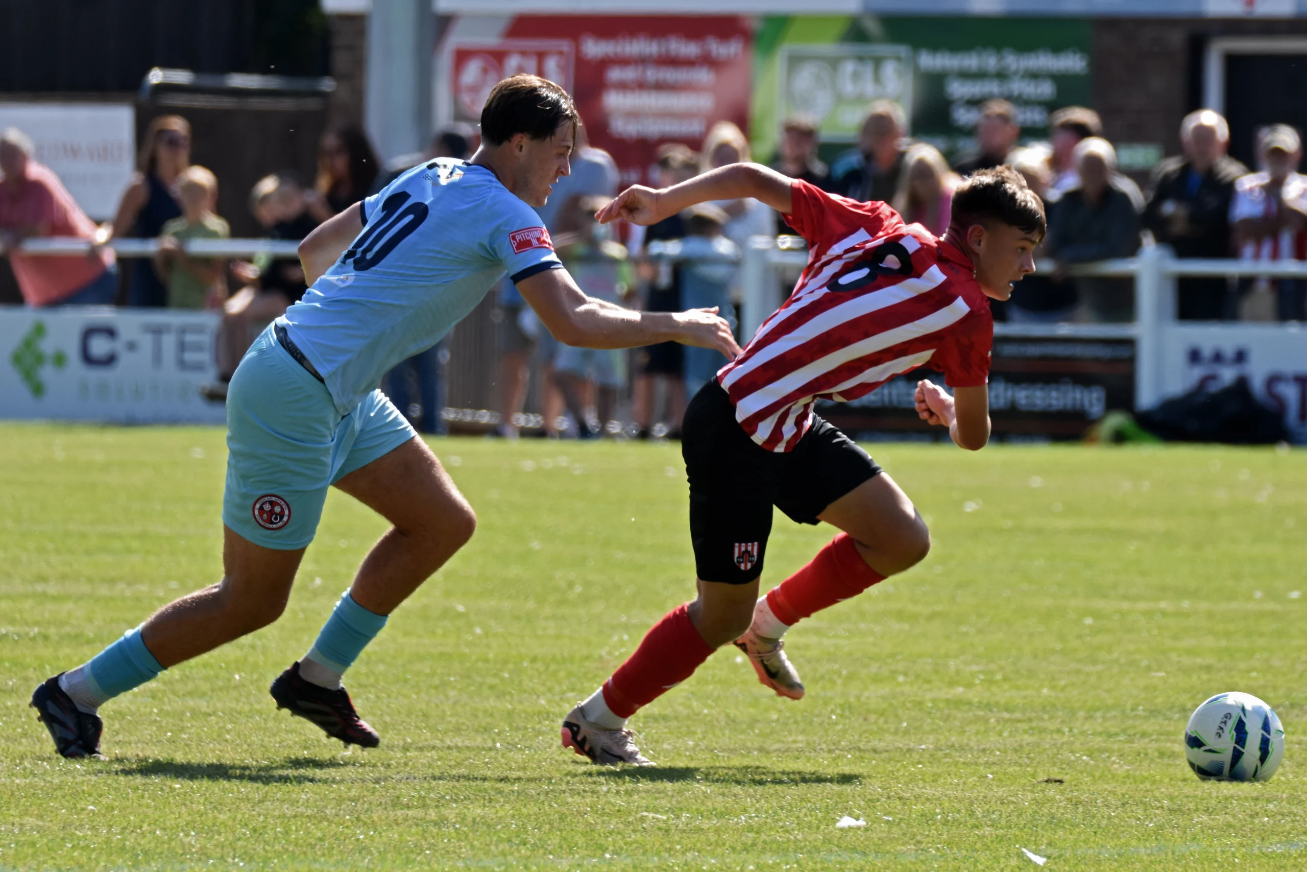 Superb action shot of Guisborough’s young midfielder Tommy Dowson showing a great turn of speed.