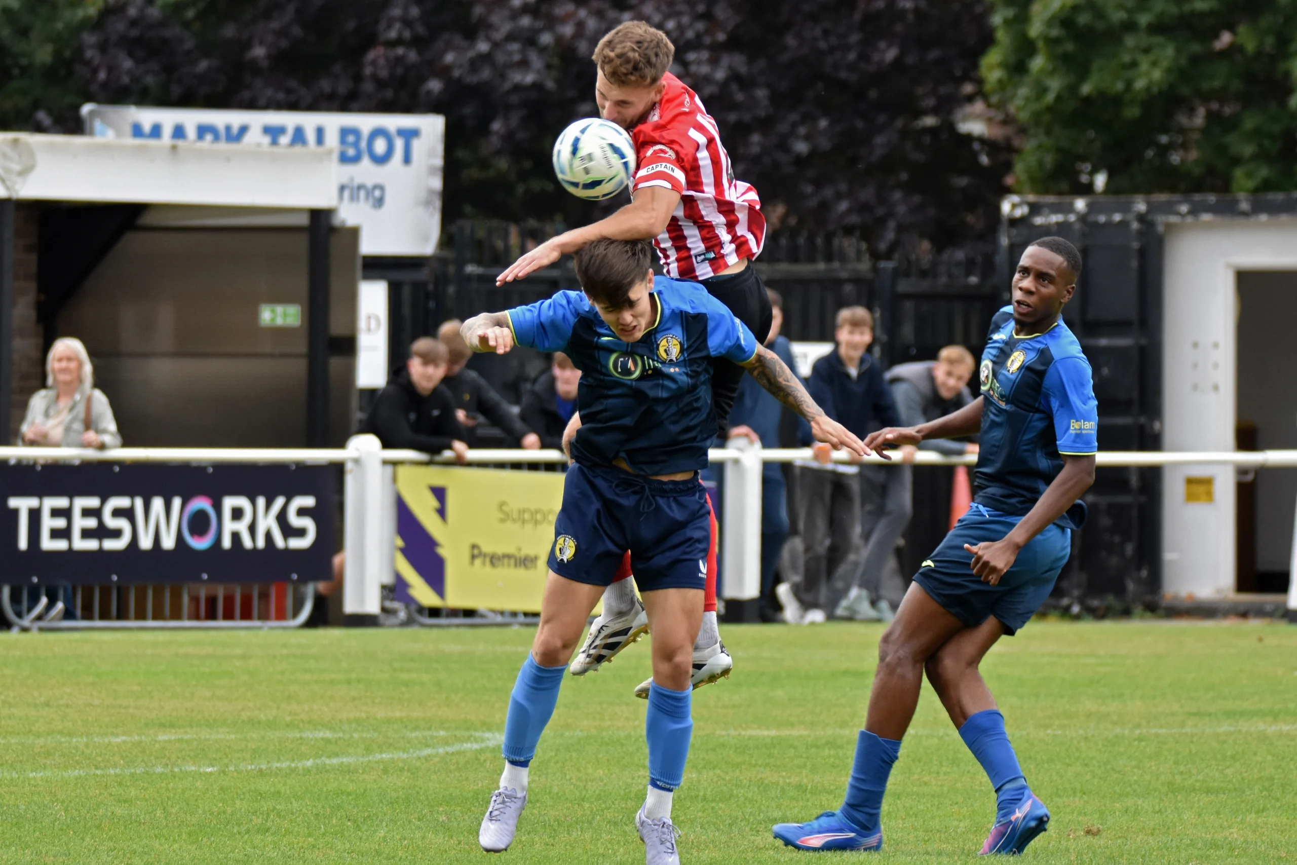 Ben Errington gets up over his man to win the ball.