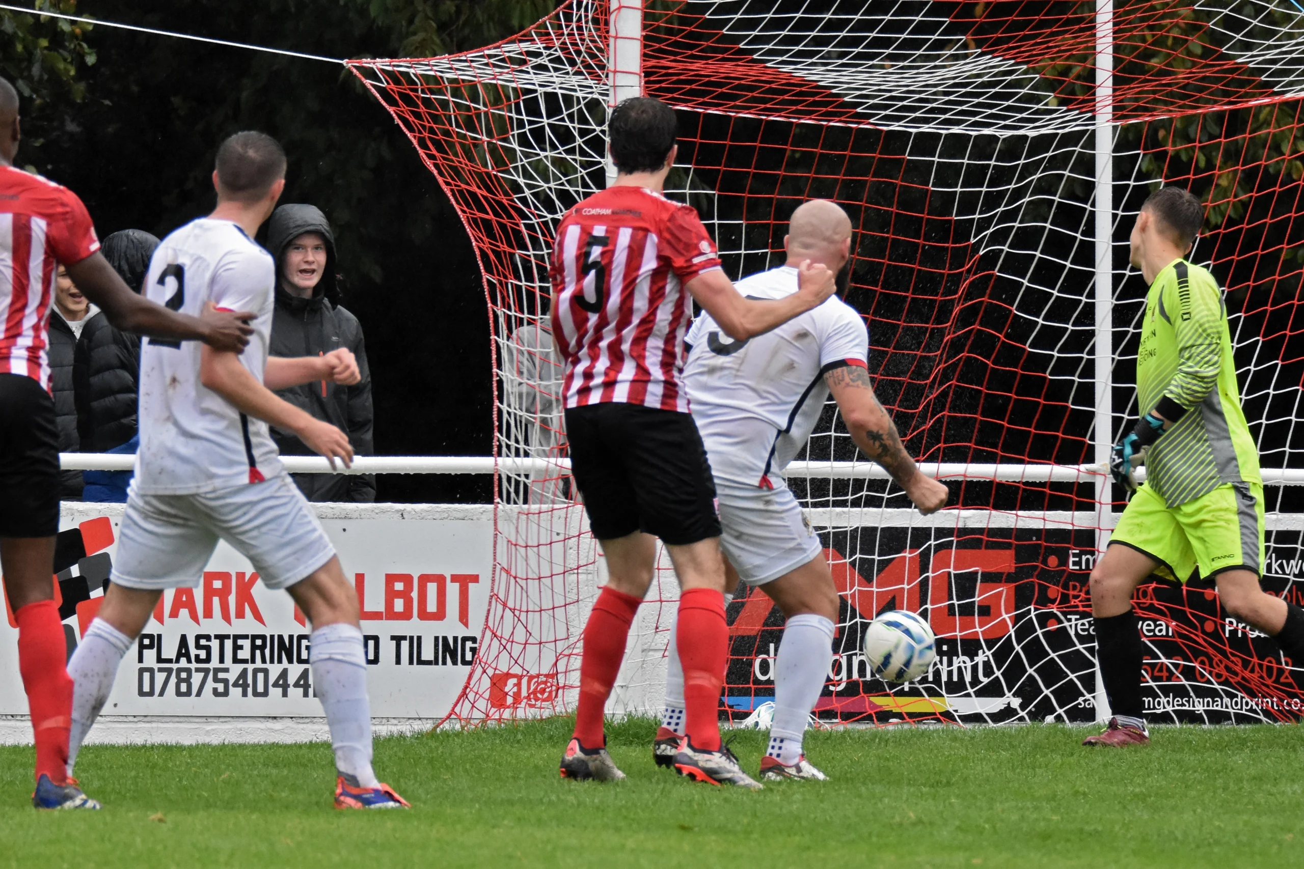 James Frazer (centre, no. 5) is already celebrating as his header sqeezes in at the far post.