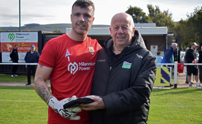 Ryan Catterick is presented with a pair of Uhlsport goalkeeper gloves after winning the Northern League Goalkeeper of the Month award for September.