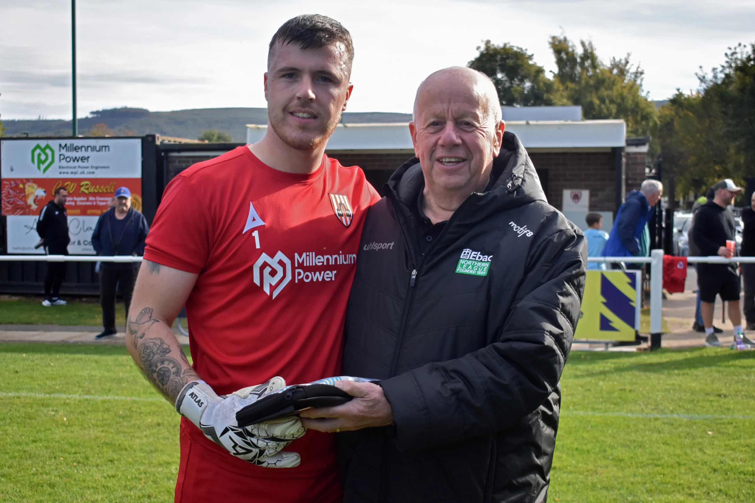 Ryan Catterick is presented with a pair of Uhlsport goalkeeper gloves after winning the Northern League Goalkeeper of the Month award for September.