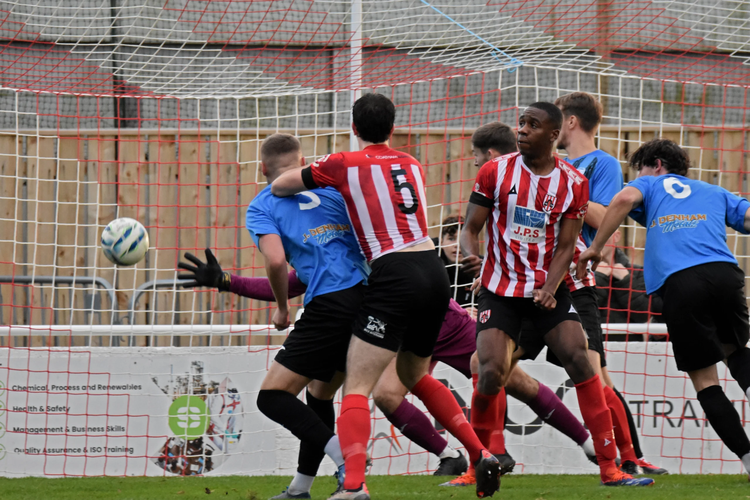 Tolu Osiyemi's header flies past the Shildon 'keeper.