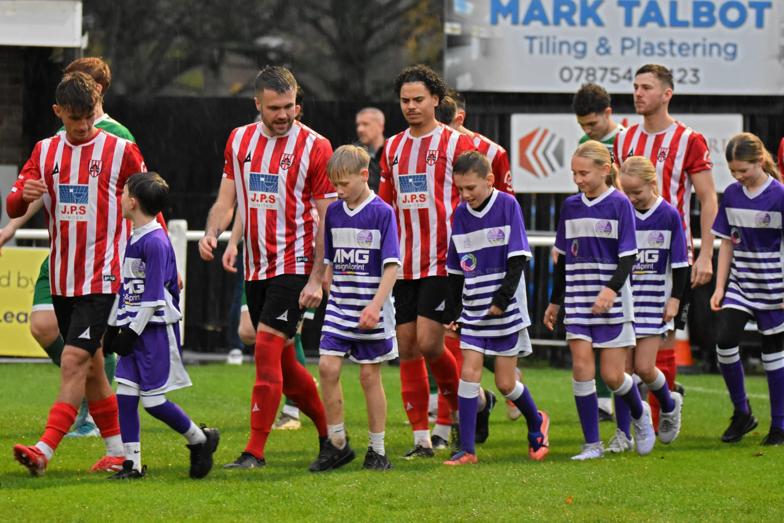 Galley Shill School strudents walk out with the team.