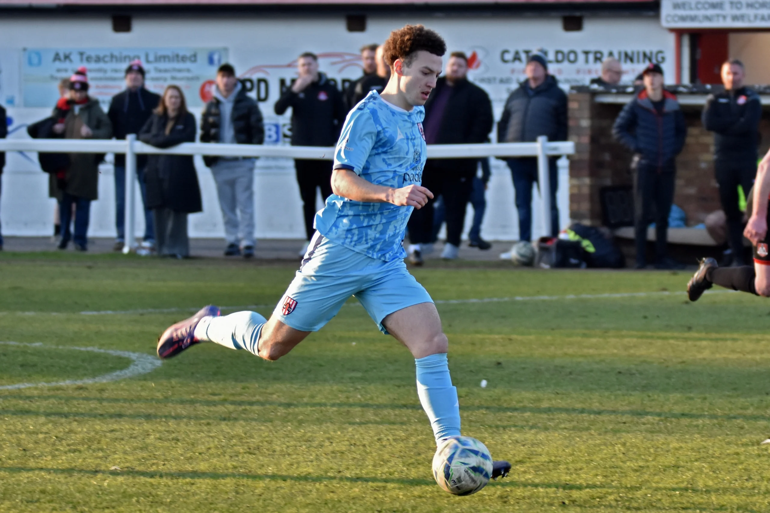 New signing Finn McKitterick beats the offside trap to run through and seal the three points.