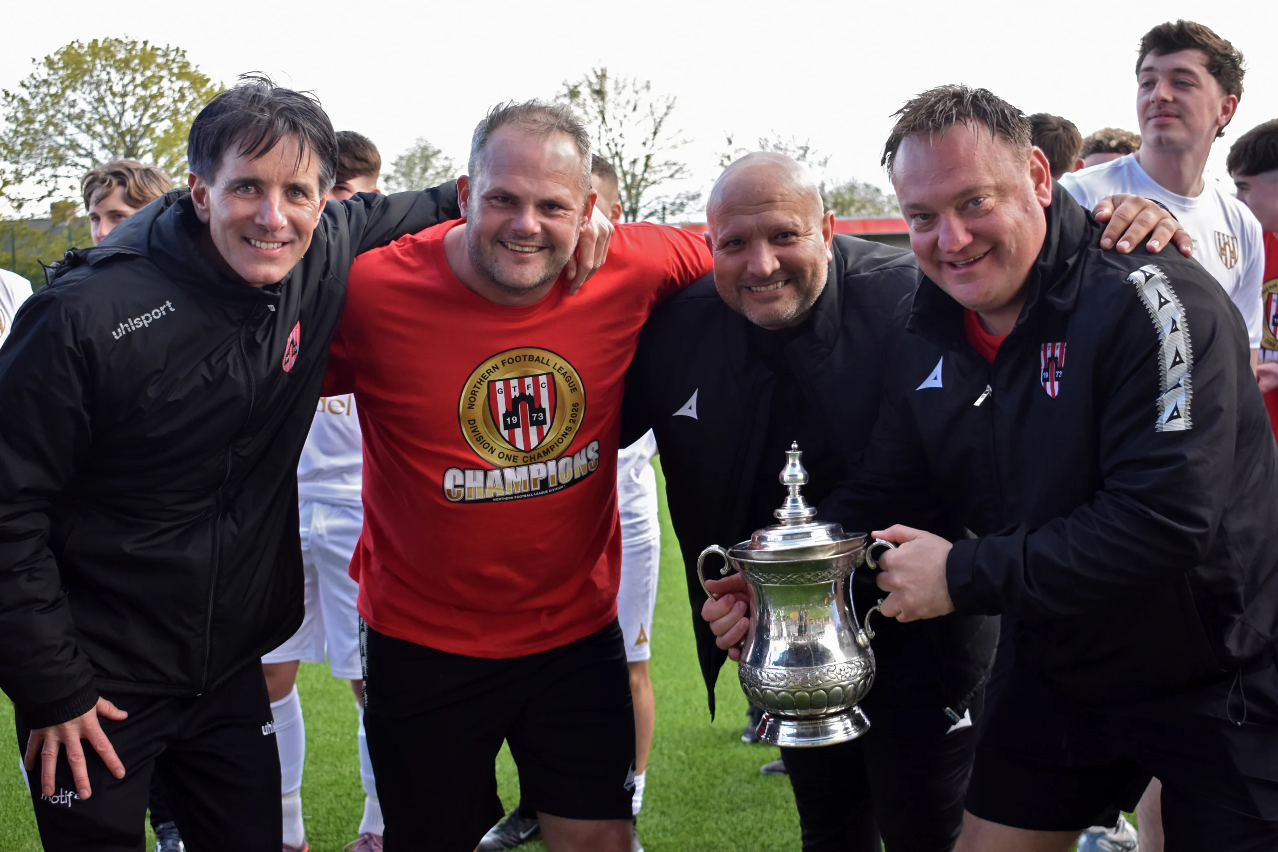 Gary Wood (second from left) with the rest of the Management team behind our 2025/26 Northern League title win.